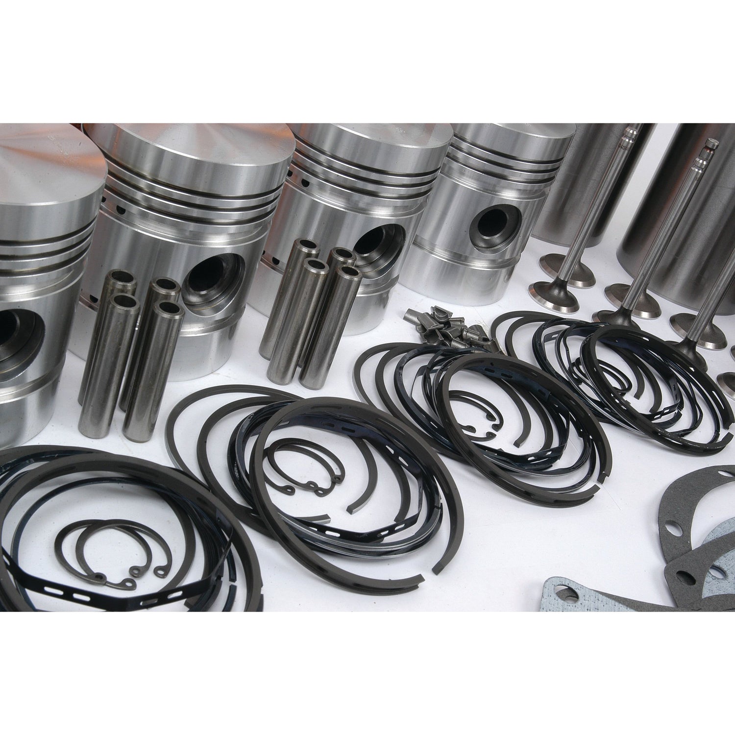 A comprehensive **Sparex Engine Overhaul Kit with Valve Train (Finished) - S.40371**, including a variety of engine components like pistons, rings, and valves for the A4.192 Model Perkins Engine, is neatly arranged on a white surface.