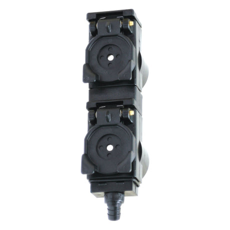 A black double socket outlet with protective covers and an angled plug cap, incorporating the Double Unit design for enhanced functionality, seen from the front, is detailed in the Faster TARV Oil Collection System by Sparex (Part No. S.112757).