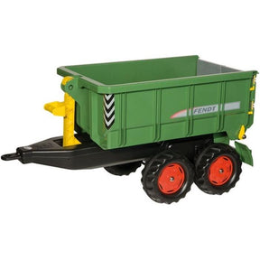 A toy trailer from AGCO's Fendt line, model X991005559000, featuring a green body with black and red wheels, yellow handles, and the words "Fendt 939 Vario" on the side.
