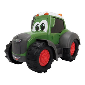 The Fendt - Fendti Happy Tractor - X991015201000 by AGCO is a green and gray toy tractor with large red wheels and a face on the front, featuring large eyes and a smiling mouth. This delightful children's toy enhances fine motor skills through interactive play.