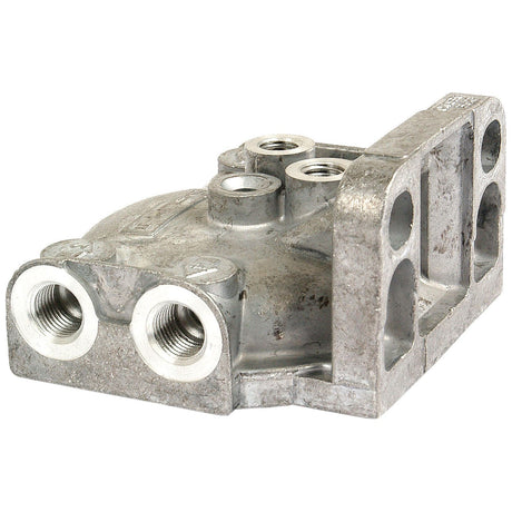 The Filter Head (Sparex Part No. S.58765) from Sparex is a metallic automotive component featuring 1/2'' UNF threaded ports and multiple mounting holes, suitable for Massey Ferguson models.