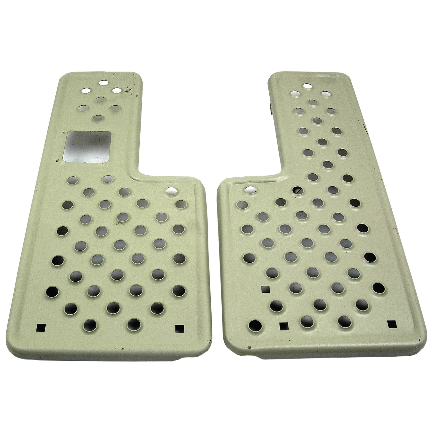 Two beige metal plates featuring multiple perforated holes, arranged in mirror symmetry, perfect for use as an RH & LH footplate set on Ford/New Holland equipment. The Footplate Set - RH & LH is available under Sparex Part No.S.66859 by the brand Sparex.