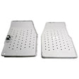 Two rectangular, perforated metal sheets with slightly raised edges are placed side by side on a white background. One sheet has a small attached metal bracket. This is the Footplate Set - RH & LH (Sparex Part No.S.67131) from Sparex, designed for Ford New Holland tractors, providing durability and functionality in various conditions.
