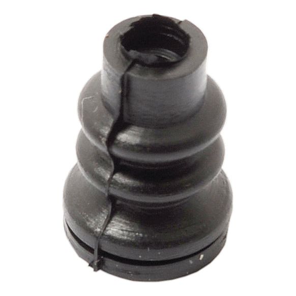 Close-up of a black, round ribbed rubber Fuel Button Cover (Sparex Part No.S.65290) with a noticeable vertical crack running through it.