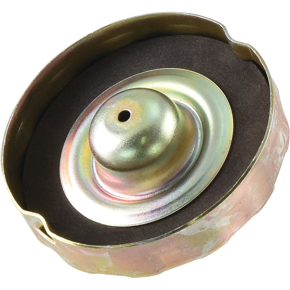 A round, metal car part with a small central hole, encased in a partially open, circular, rusty metal frame. This Sparex piece, the Fuel Cap - S.43730, also features a Cap O.D 73 for enhanced compatibility.