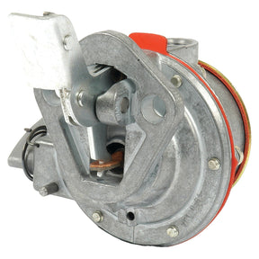 Close-up of an industrial machine part featuring a pivoting arm and multiple screws, with metallic components, bolts, and a red band. This specific component is the Sparex Fuel Lift Pump (Part No. S.66453), designed for Ford New Holland machinery.