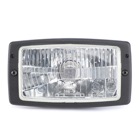 Close-up view of the AGCO Fendt - Headlight - G246900020050, showcasing its rectangular shape with a clear lens, black frame, and visible internal components and markings, making it perfect for tractor illumination on Fendt Models.