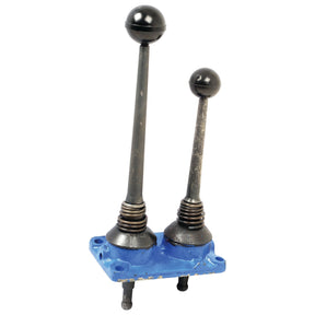 The "Gear Lever Assembly | Sparex Part No.S.68312" from Sparex features two black gear shift levers of varying heights, mounted on a blue metal base, evoking the design of control levers found in classic Ford Dexta tractors.