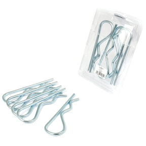 Seven Grip Clip - Single Wound pins (Clip Ø7mm x 163mm, Sparex Part No.S.25815) are shown, with five laid out beside clear plastic packaging branded Agripak containing the remaining two pins.