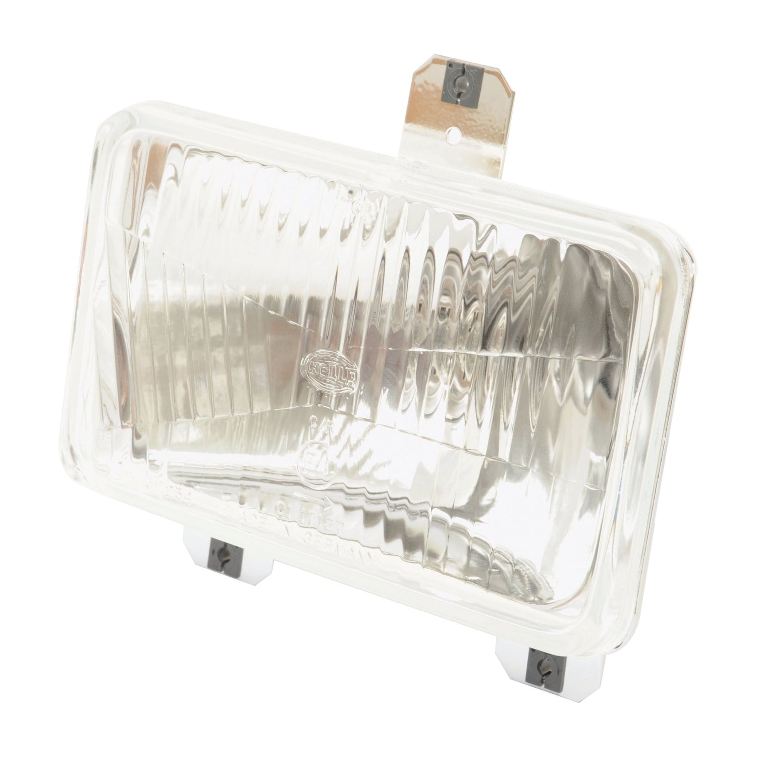 The Sparex Headlight (Halogen) RH & LH, LH Dip, 12V - S.43906 features a rectangular clear glass lens with a metal mounting bracket at the top. This IP65-rated headlight offers a textured surface and utilizes a halogen light source. It also includes two screws at the bottom for easy installation.
