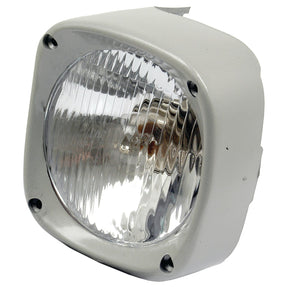 The Sparex Head Light and Cowl Kit (Halogen) LH, LH Dip, 12V - S.41947 is a square, silver-colored headlight cowl with a reflective surface, firmly secured by four screws. This sleek unit often features a halogen light and boasts an impressive IP65 rating for durability.