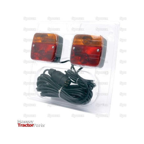 The Lighting Set (Halogen) from Sparex, featuring two rectangular clear plastic-encased tail lights with orange and red sections, made of reinforced polycarbonate, comes packaged with a long black cable and a 7-pin plug connector. The text on the packaging states "Massey Tractor Parts.