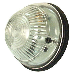 The Sparex Marker Light - Front Facing (Halogen), RH & LH, 12V - S.35791 is a clear, circular industrial light fixture featuring a grooved lens and reflective interior. It mounts on a wall bracket and is crafted from high-quality marker housing material, designed for easy replacement bulb installation.