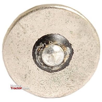 Close-up image of a small, circular metallic object with a slightly raised center, resembling the base of the Sparex Light Bulb (Filament) 12V, 35W, BA20s. The words "Massey Tractor Parts" appear partially visible in the bottom left corner.