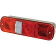 The Rear Combination Light by Sparex, designed for left-hand (LH) installation and operating at 12V (S.119736), features two red lenses for the brake and tail functions, an amber lens for the indicator, and a white central light or switch. This halogen light unit is housed in a durable metallic frame to ensure optimal visibility.