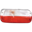 The Halogen Rear Combination Light 12V, LH - S.119749 by Sparex is a rectangular vehicle tail light featuring a clear top section and a red bottom section, designed with a textured pattern for light diffusion. Its polycarbonate lens ensures durability while enhancing the overall aesthetics.