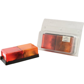Two rectangular Halogen Rear Combination Lights 12V, RH & LH - S.19330 from Sparex, featuring red and amber lenses. One light is unpackaged, while the other is packaged in a clear plastic shell with a Sparex label.