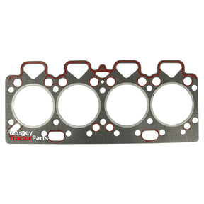 Photo of a metal engine gasket with four circular openings labeled "Sparex" on the lower left side, ideal for use with Perkins Engine Parts. Product: Head Gasket - 4 Cyl. (A4.236, A4.212, A4.248) | Sparex Part No.S.41951.