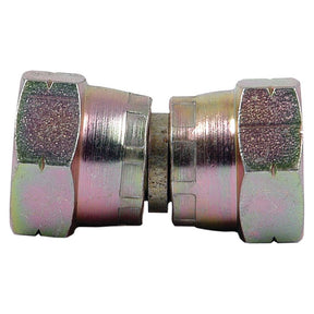 A close-up of a Sparex Hydraulic Adaptor M16x1.50 Metric Swivel Female x M16x1.50 Metric Swivel Female (Sparex Part No.S.12023) with a hexagonal shape at both ends. The connector's surface appears textured and metallic.