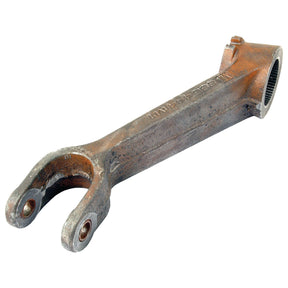 A rusty hydraulic lift arm, Sparex Part No. S.41354, with a cylindrical attachment point at one end and a U-shaped split with bolt holes at the other end, compatible with Massey Ferguson tractors from the Sparex brand.
