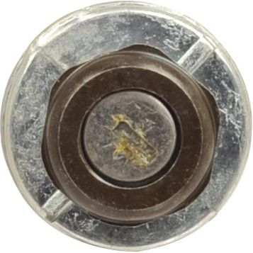A close-up view of a weathered Sparex Ignition Switch (Part No. S.75818) bolt head shows a circular groove and some surface scratches, reminiscent of wear typically found on machinery like old John Deere equipment.