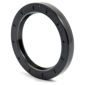 A black circular rubber Imperial Rotary Shaft Seal, 2 5/16'' x 3 1/8'' x 3/8'' Single Lip (Sparex Part No.S.40807), with ridges on the exterior edge, standing upright on a white surface.