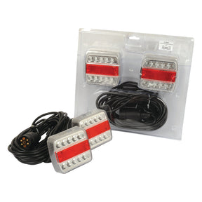 The Sparex LED Lighting Set (S.25387) is shown, featuring a 12V Max setup with four functions: brake, tail, indicator, and number plate lighting. The set includes red lenses and attached 7.5M cabling for easy installation. Two lights with magnetic fixing are displayed outside the packaging along with their cables.