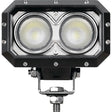 Close-up of the Sparex LED Work Light (Cree High Power), featuring a black, dual-lens design with a rectangular housing and silver mounting bracket. With 6000 Lumens Raw and a voltage range of 10-60V, this Class 3 interference work light is suitable for various environments, combining durability with high-performance illumination.