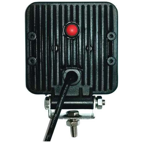 Rewritten Sentence: The rear view of the Sparex LED Work Light, model S.29318, reveals a square black electronic device with a ridged surface and a red button in the center. It is suitable for various applications and features an attached cable at the bottom along with visible mounting hardware. For detailed product specifications, please refer to the included manufacturer's information. This Class 1 work light offers 1800 lumens raw and supports a voltage range of 10-30V.