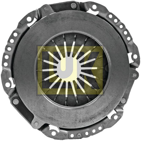 A circular Sparex Clutch Cover Assembly - S.145200 with a yellow and black logo in the center background. The assembly features a pressed steel housing, evenly spaced holes for 6 bolts along the outer edge, and a series of radial fins.