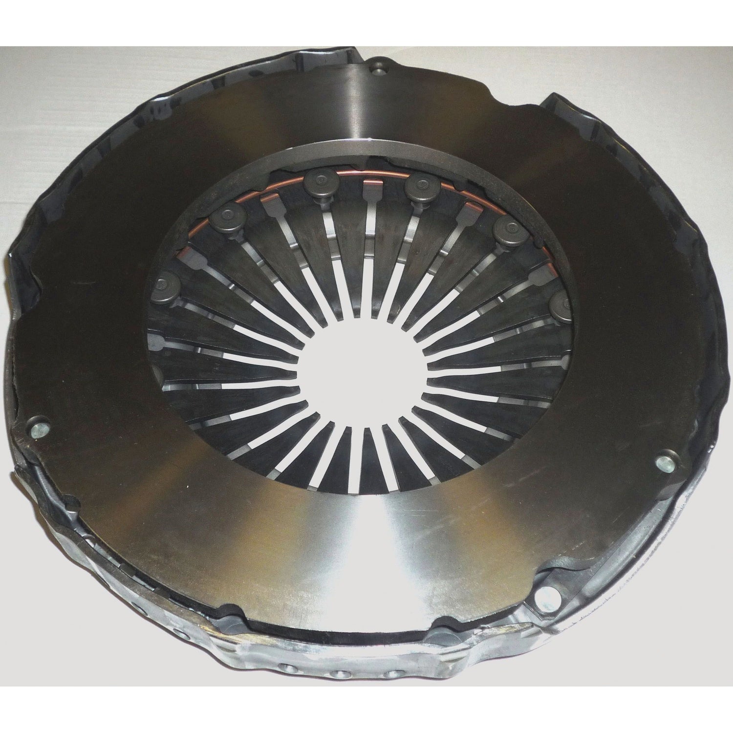 A Clutch Cover Assembly - S.145318 by Sparex, featuring a pressed steel metallic automotive clutch pressure plate with a dark outer ring, visible springs, and ventilation holes is displayed in the image from the front view, highlighting its LUK design quality.