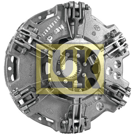 Close-up of the Clutch Cover Assembly - S.145361 by Sparex, showcasing its metal finish with various springs and fittings, overlaid with the stylized letters "UK" in yellow. The numerous bolts enhance its intricate design.