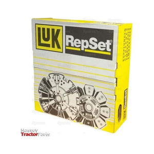 A yellow and white box containing the Sparex Clutch Kit with Bearings - S.128838 features a diagram of clutch components, including a cerametallic disc. The box has black and gray text and graphics, "Massey Tractor Parts" branding in the lower left corner, and notes the cover size as 330mm.