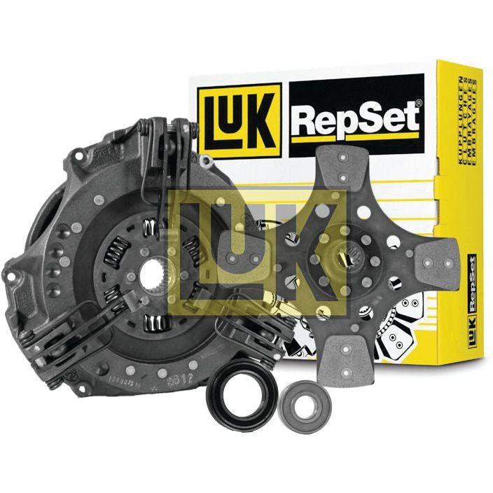 A Clutch Kit with Bearings - S.146635 from Sparex, featuring a pressure plate, clutch disc, and throw-out bearing, is displayed in front of its yellow and white box. The components are housed within a durable cast iron cover to ensure longevity.