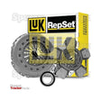 A set of tractor parts, including a clutch and pressure plate, displayed in front of a yellow and black Sparex RepSet box for the Clutch Kit with Bearings - S.147172, with precise cover size detailing.