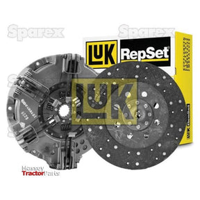 The Sparex Clutch Kit without Bearings (S.146953) features a 310/310mm cover and includes both a clutch disc and pressure plate. It comes packaged in a box with visible yellow branding and text.