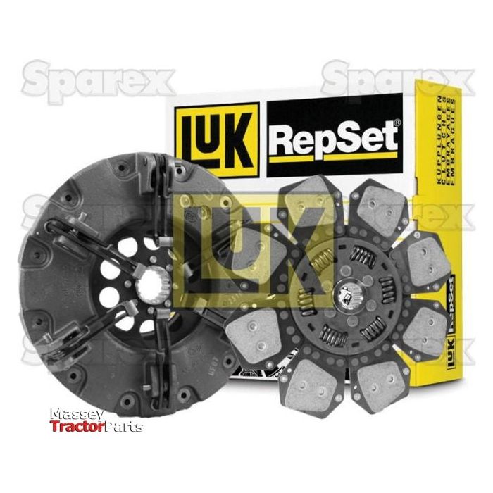 Image shows a Sparex S.146984 Clutch Kit without Bearings, including a 310/310mm clutch disc and pressure plate, against a white background with branding visible. The packaging box is positioned behind the components.