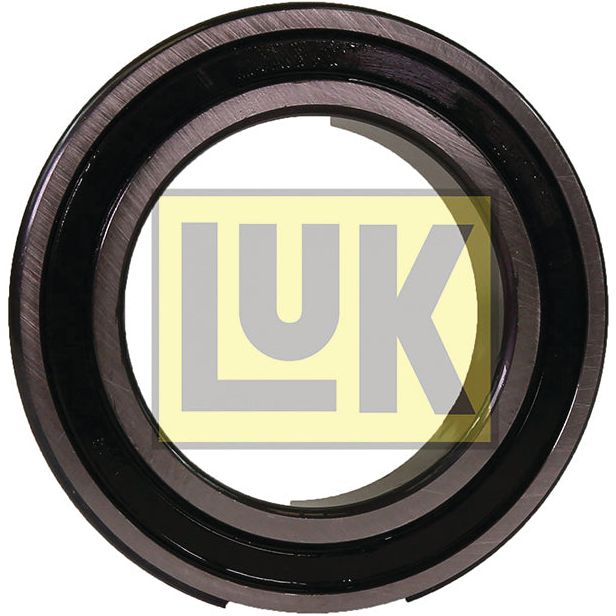 Close-up of a cylindrical mechanical component, specifically a LUK Clutch Release Bearing - S.146349 by Sparex, bearing the text "LUK 500039240" set against a bright yellow background.