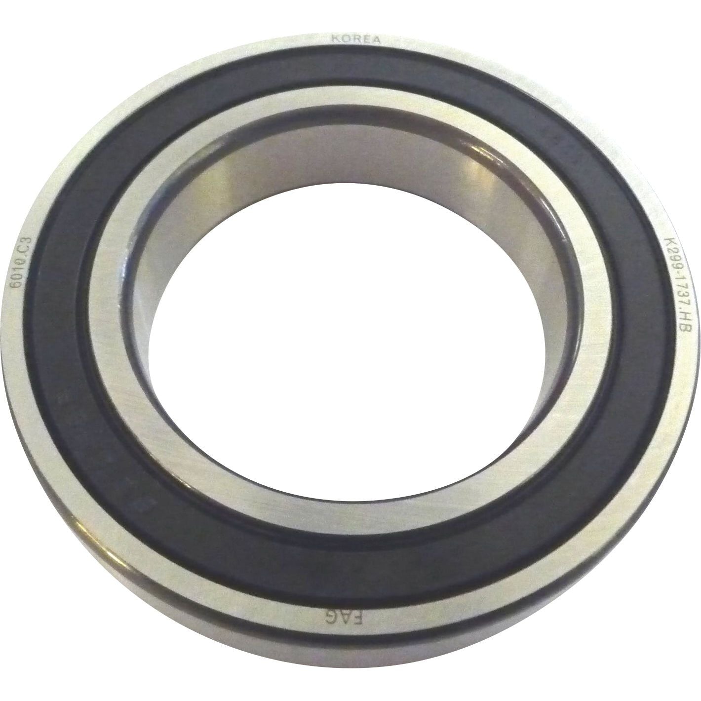 A circular metal bearing, marked with "Korea" and "FAG," features visible black seals on both sides. This 50mm OD clutch release bearing, named LUK Clutch Release Bearing - S.146409 and branded as Sparex, is labeled with various specifications for easy identification.