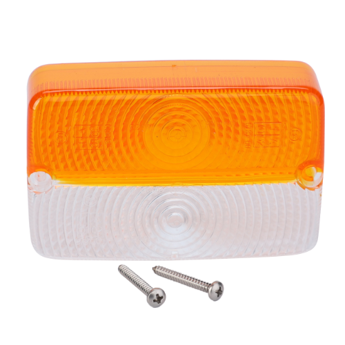 The AGCO Massey Ferguson - Lens Front L/H or R/H - 1424346M1 is a rectangular plastic light cover featuring an amber top half and a clear bottom half, complete with two metal screws, designed specifically for the 100 Series tractors from Massey Ferguson.