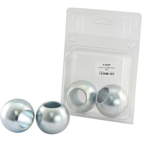 Three silver spherical objects, one with a hole and one with a larger opening, are placed next to a clear plastic package labeled Sparex S.23005 and featuring a barcode.