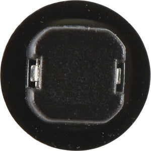 A close-up image shows a black electronic component resembling an inductor or coil, featuring a flat top and metallic terminals on either side. This part closely resembles the type of component used in the 12V, 1.2W Light Bulb (Filament), B8.5d by Sparex, Sparex Part No.S.138078.
