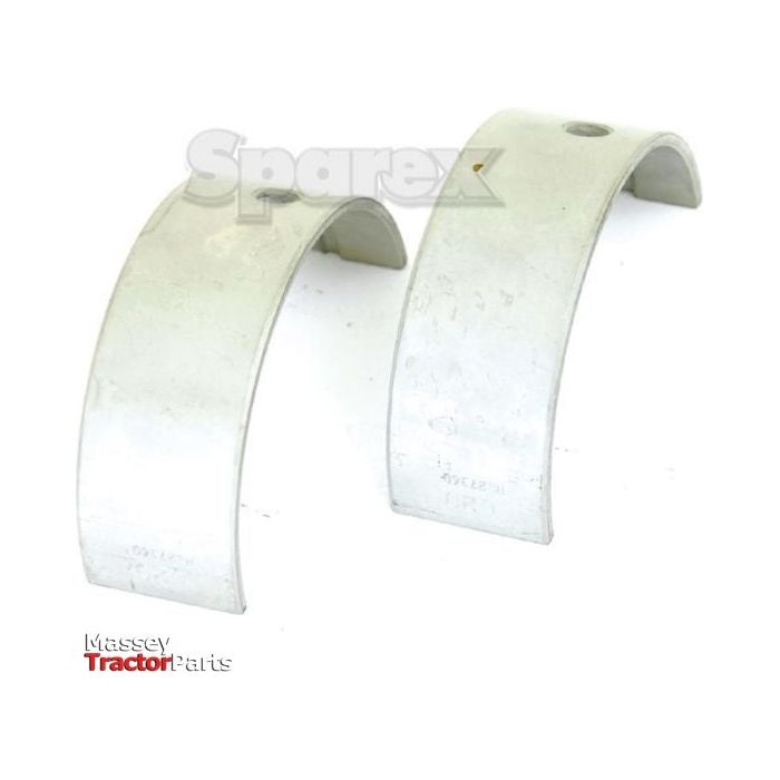 Two curved metallic parts with a logo "Sparex" in the background and a "Massey TractorParts" watermark in the bottom left corner, ideal for replacing John Deere main bearings, specifically labeled as Main Bearing +0.020'' (0.50mm) (Pair) | Sparex Part No.S.20803 from Sparex.