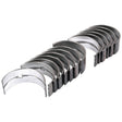 A set of Main Bearing +0.030'' (0.75mm) (Set), known as Sparex Part No.S.60338 from the brand Sparex, designed for smooth rotation of the crankshaft rods and often found in Perkins Build List or Massey Ferguson engines, arranged in two rows for optimal performance.