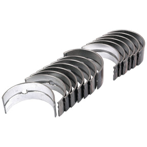 A set of Main Bearing +0.030'' (0.75mm) (Set), known as Sparex Part No.S.60338 from the brand Sparex, designed for smooth rotation of the crankshaft rods and often found in Perkins Build List or Massey Ferguson engines, arranged in two rows for optimal performance.