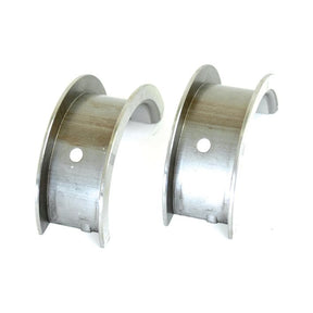 The Main Bearing Std. (Pair) by Sparex, part number S.20941, consists of two semi-circular metal pieces with a central hole, widely used as engine bearings and essential for John Deere tractor machinery.