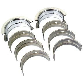 Introducing the Sparex Main Bearing Std. (Set) | Sparex Part No. S.75842 by John Deere— a meticulously arranged set of engine bearings in two rows. These semi-circular bearings boast a metallic finish and come with a central hole for precise alignment.