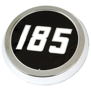 A round black and silver medallion with the number "185" in bold white text in the center, reminiscent of the Massey Ferguson 185 emblem, Massey Ferguson 185 | Sparex Part No.S.42552 by Sparex.