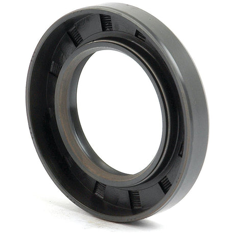 Close-up of a single dark-colored rubber seal with a circular shape and ridged inner lining, known as the Sparex Metric Rotary Shaft Seal, 40 x 65 x 10mm Double Lip (Sparex Part No. S.50322), used for preventing leaks between stationary and moving components in machinery.
