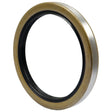 A close-up image of the Sparex Metric Rotary Shaft Seal, 75 x 95 x 10mm Double Lip (Sparex Part No. S.50454), made of metal and rubber, used to prevent leakage in machinery.